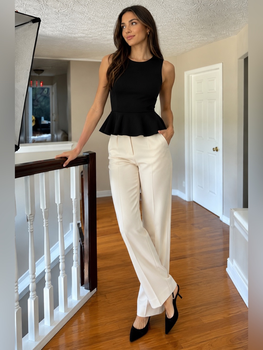Like New, Alice + Olivia Black Sleeveless Peplum Top